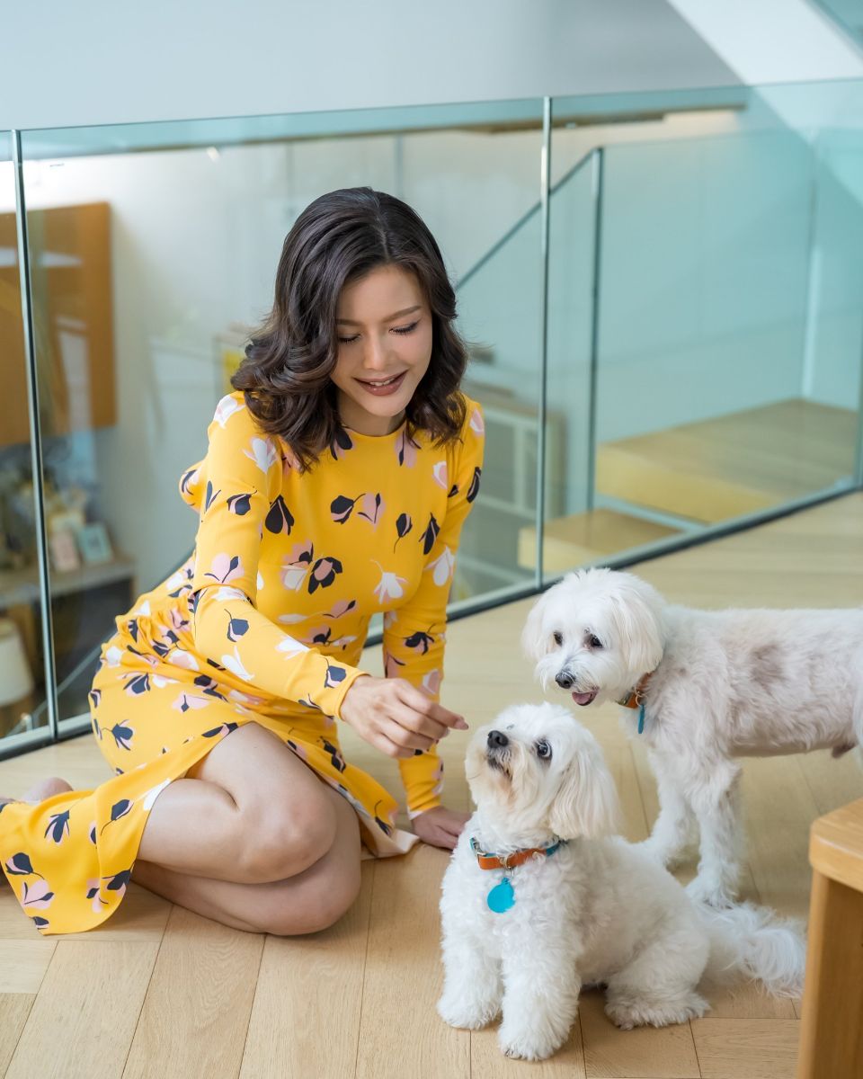 Kae at home with her dogs